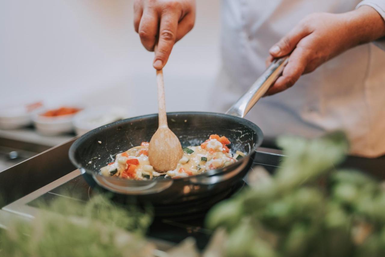 Hotel Miramare Crikvenica Exterior foto A wooden spoon being used in a pan